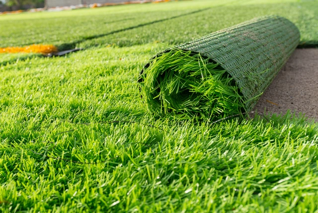 Roll of artificial grass ready for lawn installation
